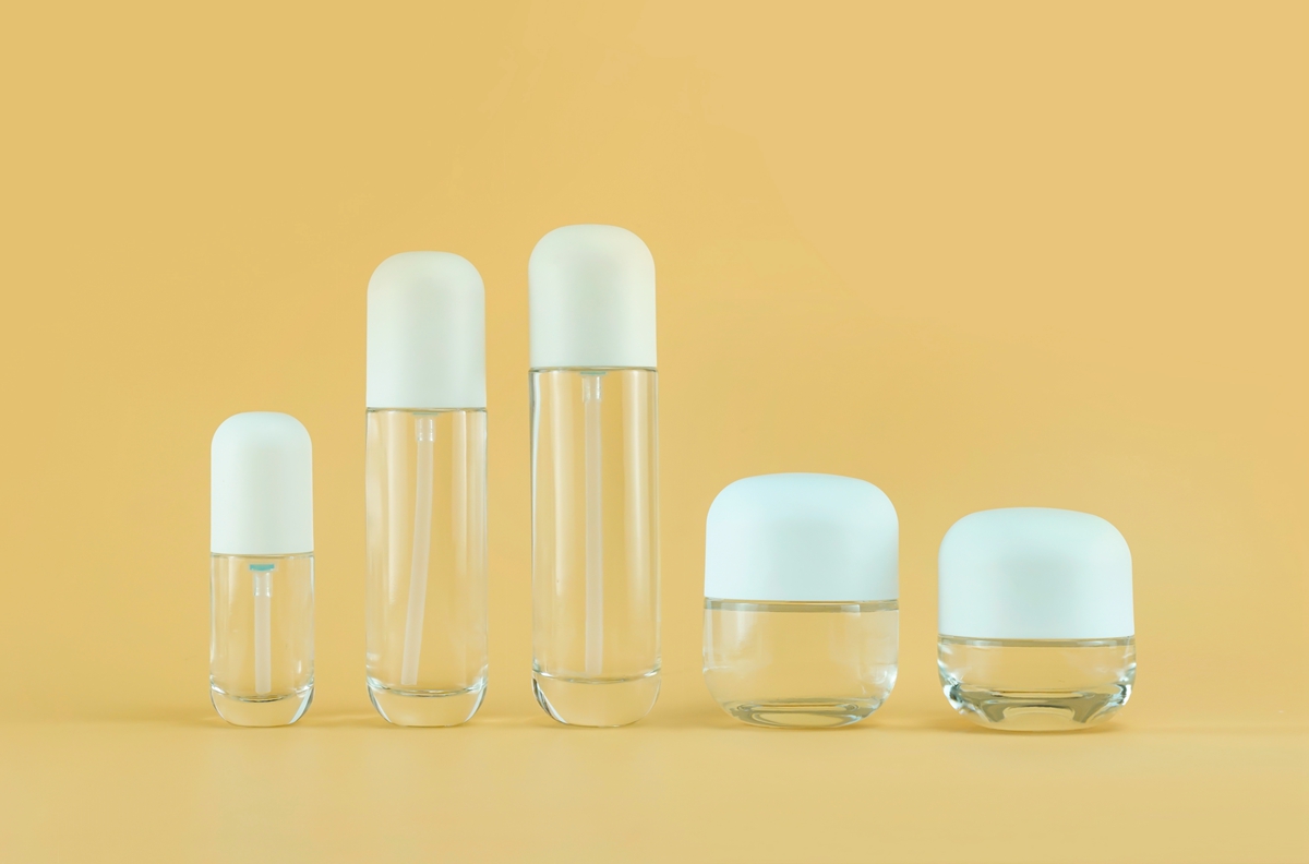 glass bottles and jars with round cap and bottom 